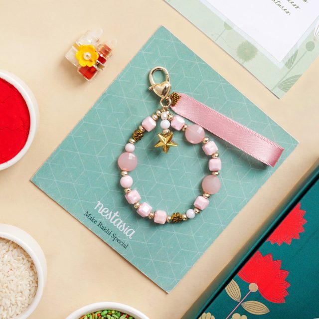 Pookie Pink Charm Bracelet Rakhi Gift Set by Nestasia